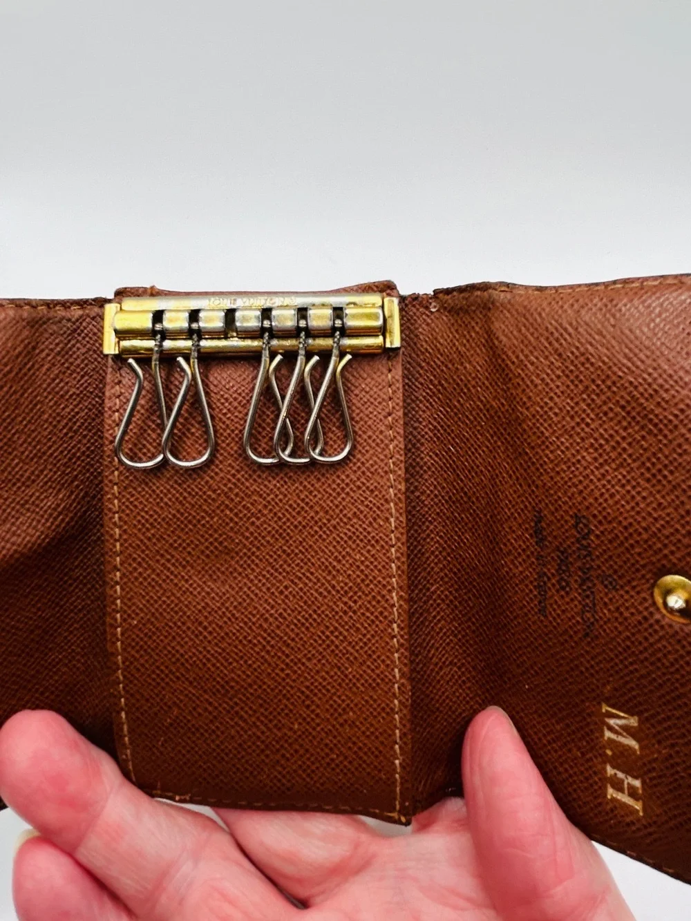 Louis Vuitton Monogram Key Pouch in Dark Brown with Gold Snap good condition